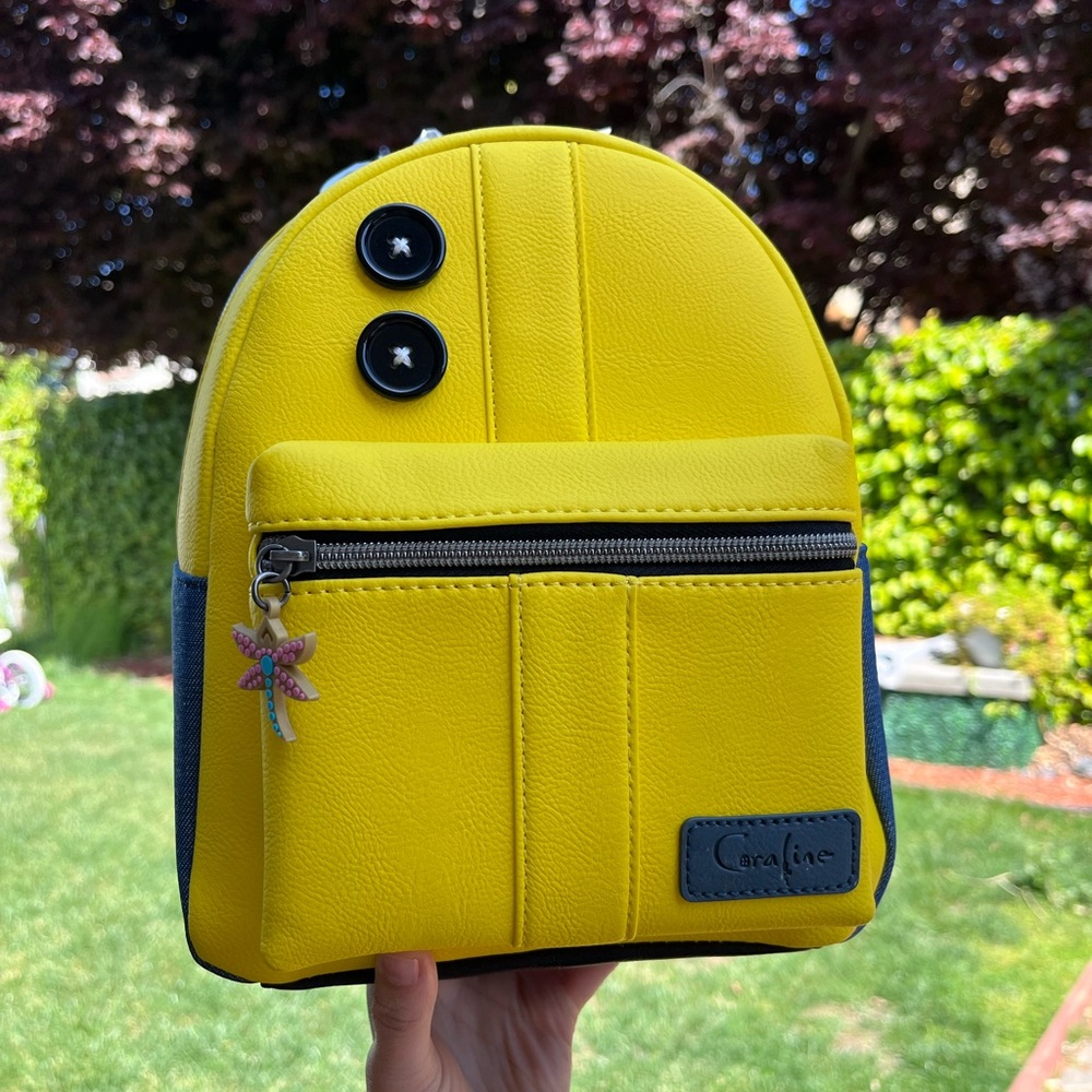 HTF Coraline yellow coat Loungefly